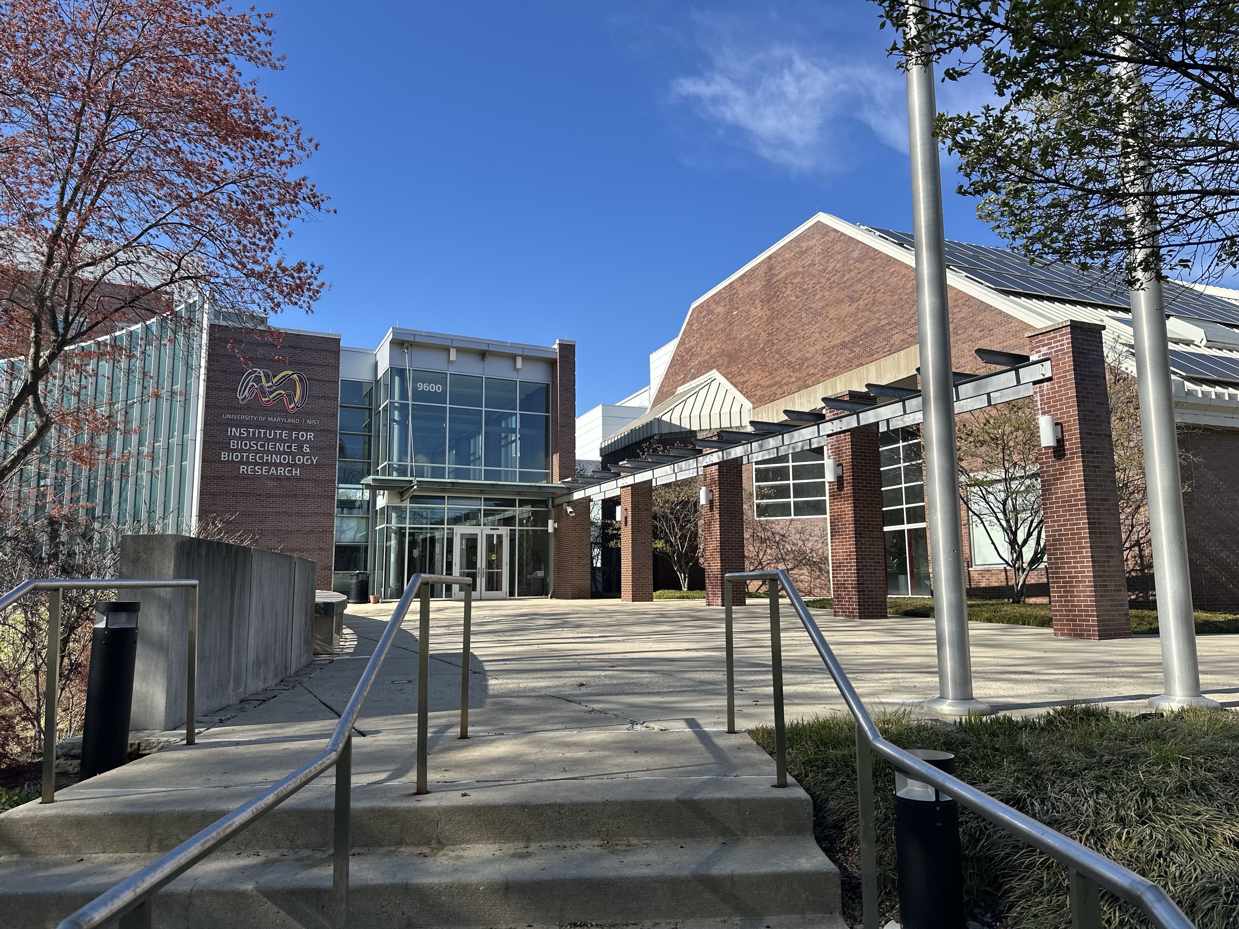 Dr. John Schiel holding a figure of the NISTmAb
